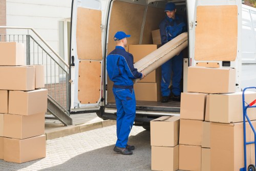 Removal team loading furniture for a move in Roehampton