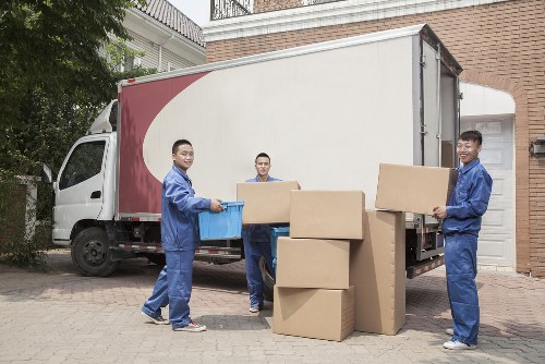 Packed boxes and moving equipment prepared for a local house move