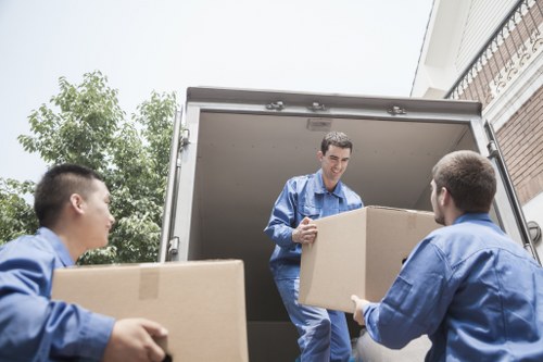 Careful handling of furniture and boxes during Roehampton flat move