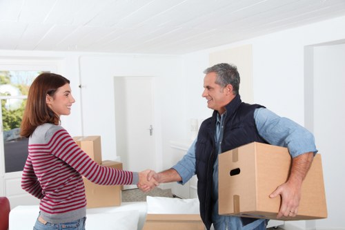 A professional packing team helping a Roehampton resident prepare for moving day